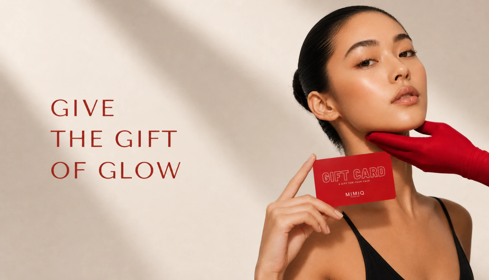 MIMIQ gift-of-glow campaign with a red facial gift card and the signature red glove